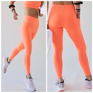 NWT Free People Out Of Your League Leggings in Tangerine. Size Medium